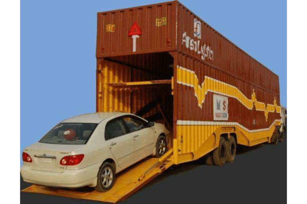 Vehicle being loaded onto a transport truck